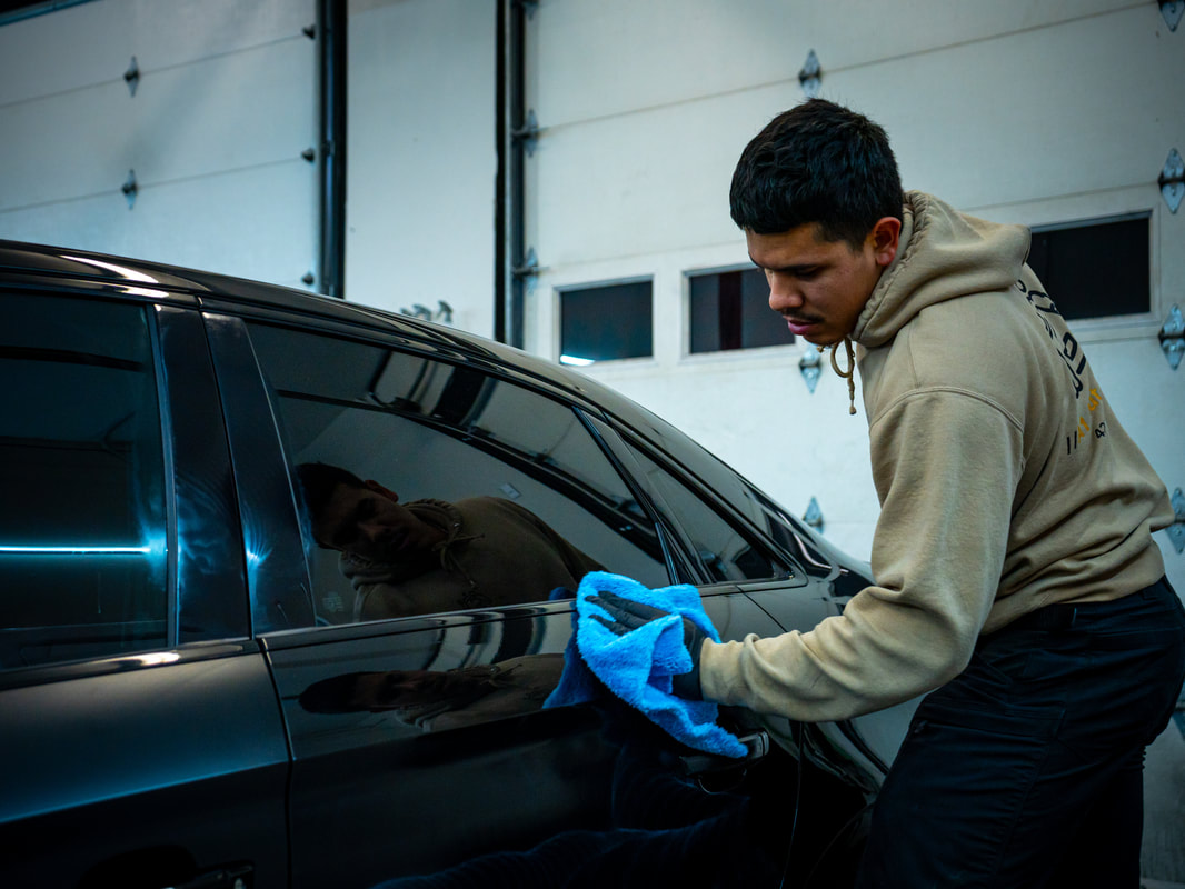 Interior car detailing with leather conditioning